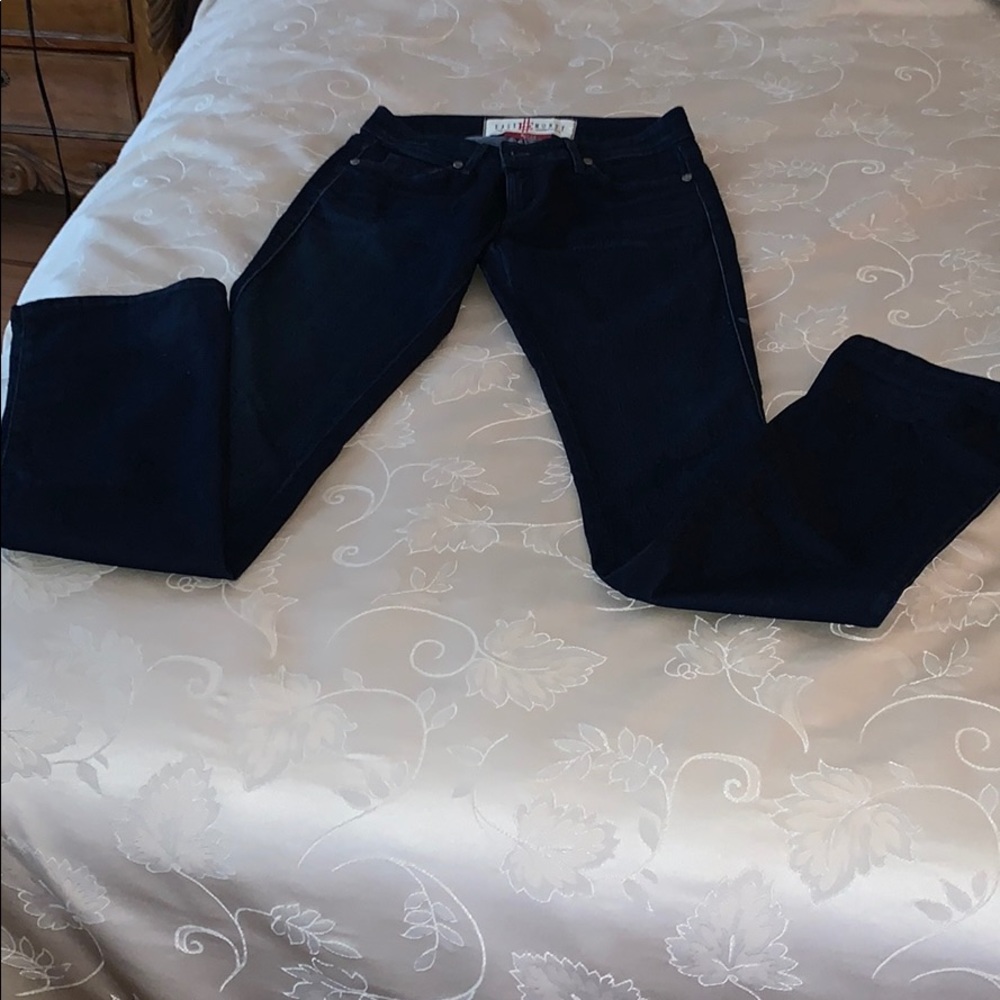 Dark blue never worn boot style jeans